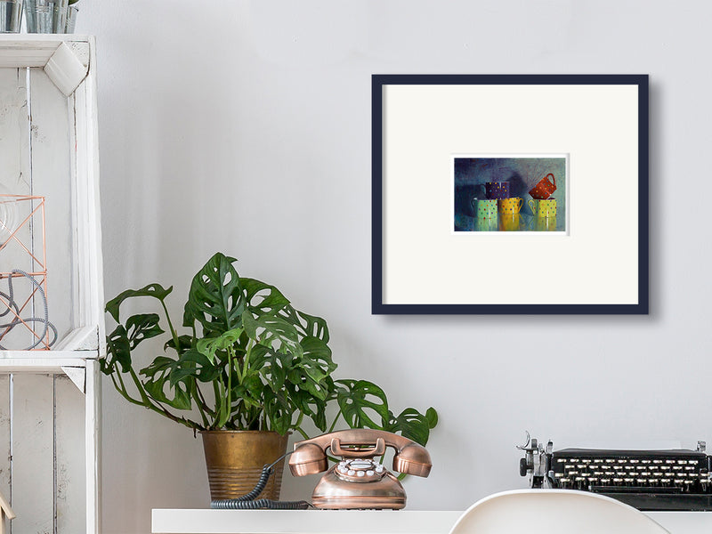 Small art with big presence displayed in peaceful home office environment